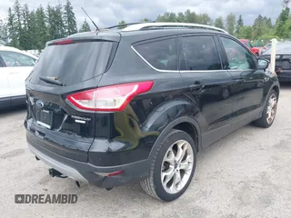 2013 Ford Escape Titanium with VIN 1FMCU9J98DUB02238, listed as a IAAI auction lot 42609782 with 168,574 mi miles and . Bid and sale history available at DreamBid. Image 4.