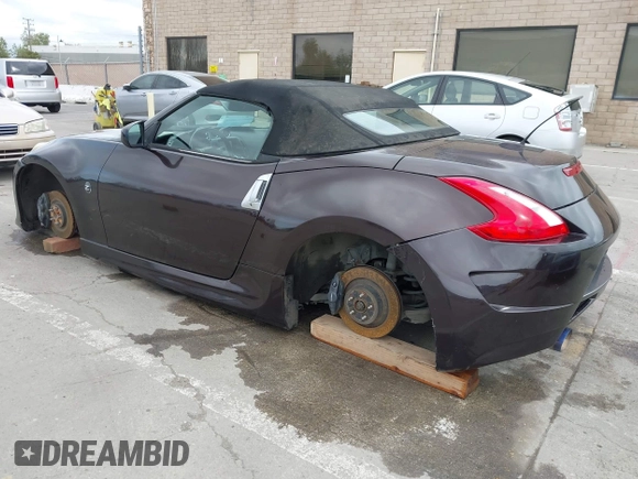 2010 Nissan 370Z Touring with VIN JN1AZ4FH3AM301311, listed as a IAAI auction lot 41976379 with 51,347 mi miles. Bid and sale history available at carsss.com. Image 3.
