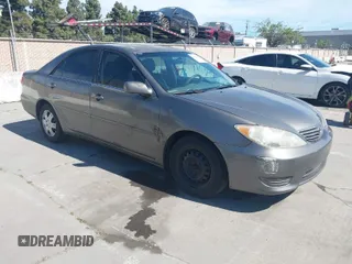 2006 Toyota Camry STD with VIN 4T1BE32K96U648038, listed as a IAAI auction lot 42024982 with 218,227 mi miles. Bid and sale history available at carsss.com. Image 1.