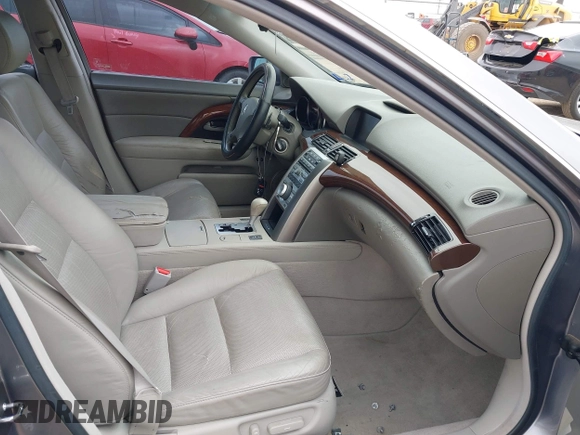 2006 Acura RL z VIN JH4KB16526C006190, wystawiony jako IAAI lot #42351400 z przebiegiem 150 749 mil mil oraz . Historia ofert i sprzedaży dostępna na DreamBid. Obrazek 5.