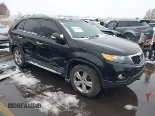 2012 Kia Sorento EX with VIN 5XYKUDA2XCG301636, listed as a IAAI auction lot 41619793 with 220,692 mi miles. Bid and sale history available at carsss.com. Image 1.