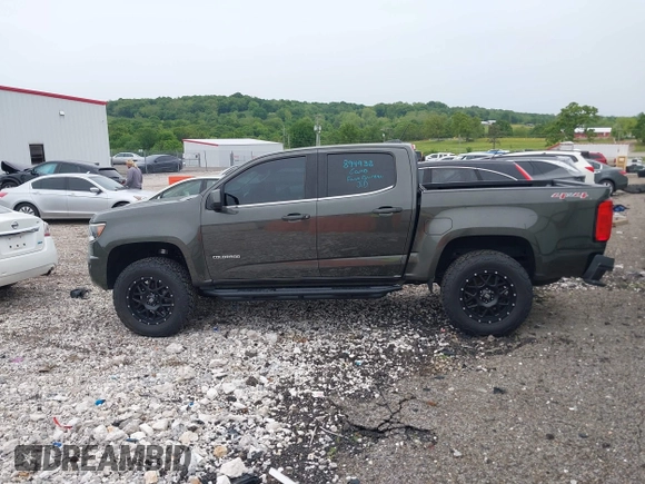 2018 Chevrolet Colorado 4WD LT z VIN 1GCGTCEN2J1235085, wystawiony jako IAAI lot #42192629 z przebiegiem 83 914 mil mil oraz . Historia ofert i sprzedaży dostępna na DreamBid. Obrazek 14.