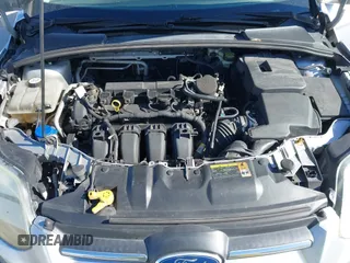 2012 Ford Focus SE with VIN 1FAHP3F23CL265724, listed as a IAAI auction lot 41184121 with 216,873 mi miles. Bid and sale history available at carsss.com. Image 10.