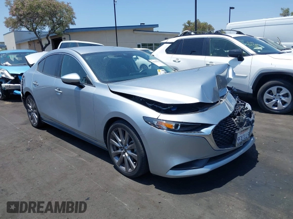 2020 Mazda 3 Select with VIN 3MZBPACL1LM131999, listed as a IAAI auction lot 42433532 with 23,067 mi miles and . Bid and sale history available at DreamBid. Image 1.