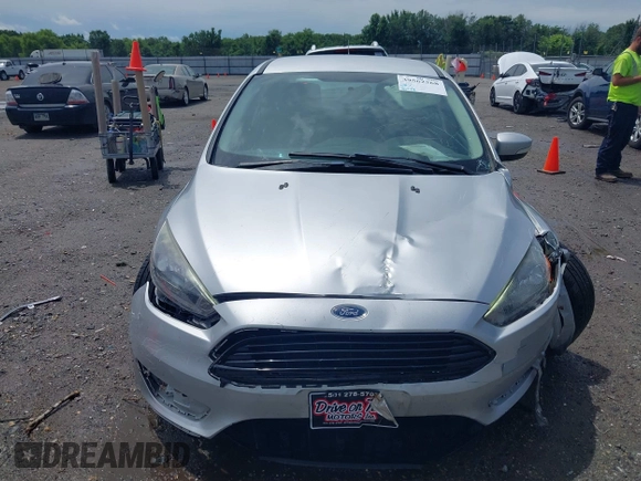 2017 Ford Focus SE with VIN 1FADP3FE4HL295573, listed as a IAAI auction lot 39562568 with 96,939 mi miles and . Bid and sale history available at carsss.com. Image 12.