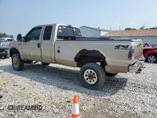 2001 Ford Super Duty F-250 XL with VIN 1FTNX21S31EA51607, listed as a Copart auction lot 64711164 with 137,934 mi miles and Salvage Title. Bid and sale history available at carsss.com. Image 2.