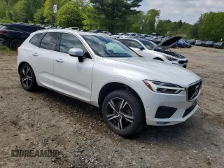 2019 Volvo XC60 R-Design z VIN LYVA22RMXKB234121, wystawiony jako Copart lot #57457405 z przebiegiem 93 792 mil mil oraz Szkoda całkowita • Salvage title. Historia ofert i sprzedaży dostępna na DreamBid. Obrazek 4.