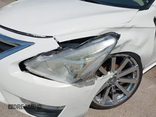 2014 Nissan Altima S with VIN 1N4AL3AP5EN335473, listed as a IAAI auction lot 41952678 with 156,474 mi miles and . Bid and sale history available at DreamBid. Image 12.