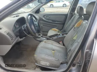 2000 Nissan Maxima GXE z VIN JN1CA31A9YT224416, wystawiony jako Copart lot #55514495 z przebiegiem 234 882 mil mil oraz Szkody całkowita. Historia ofert i sprzedaży dostępna na DreamBid. Obrazek 7.