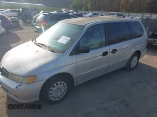 2002 Honda Odyssey LX z VIN 2HKRL18522H534580, wystawiony jako IAAI lot #41958266 z przebiegiem 176 441 mil mil oraz . Historia ofert i sprzedaży dostępna na DreamBid. Obrazek 2.