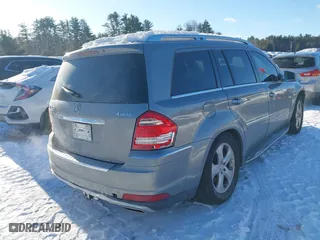 2011 Mercedes-Benz GL-Class GL 450 with VIN 4JGBF7BE3BA700323, listed as a IAAI auction lot 41586109 with 165,457 mi miles. Bid and sale history available at carsss.com. Image 4.