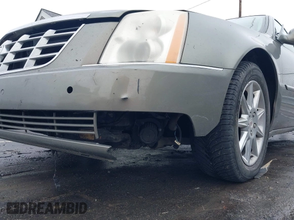 2010 Cadillac DTS 1SC z VIN 1G6KD5EY3AU134362, wystawiony jako IAAI lot #41579786 z przebiegiem 131 969 mil mil oraz . Historia ofert i sprzedaży dostępna na DreamBid. Obrazek 6.