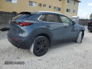 2021 Mazda CX-30 Premium with VIN 3MVDMBDY2MM306250, listed as a Copart auction lot 53430615 with 59,112 mi miles and Salvage title. Bid and sale history available at DreamBid. Image 3.