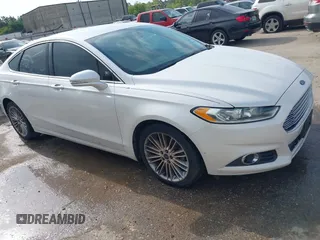 2014 Ford Fusion SE with VIN 3FA6P0HD8ER169211, listed as a IAAI auction lot 42038877 with 215,769 mi miles. Bid and sale history available at carsss.com. Image 1.