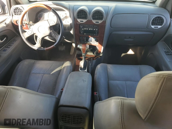 2006 GMC Envoy Denali with VIN 1GKES63M762237958, listed as a Copart auction lot 76999574 with 180,294 mi miles and Clean Title. Bid and sale history available at carsss.com. Image 8.