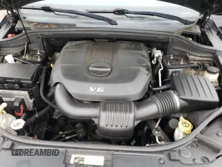 2014 Jeep Grand Cherokee Limited z VIN 1C4RJFBG7EC546642, wystawiony jako Copart lot #61445615 z przebiegiem 128 921 mil mil oraz Szkoda całkowita • Salvage title. Historia ofert i sprzedaży dostępna na DreamBid. Obrazek 11.