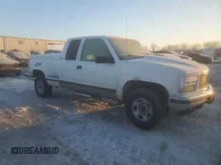 1995 GMC Sierra 1500 z VIN 2GTEK19KXS1504198, wystawiony jako Copart lot #87508215 z przebiegiem 3 210 847 mil mil oraz Szkody całkowita. Historia ofert i sprzedaży dostępna na DreamBid. Obrazek 4.