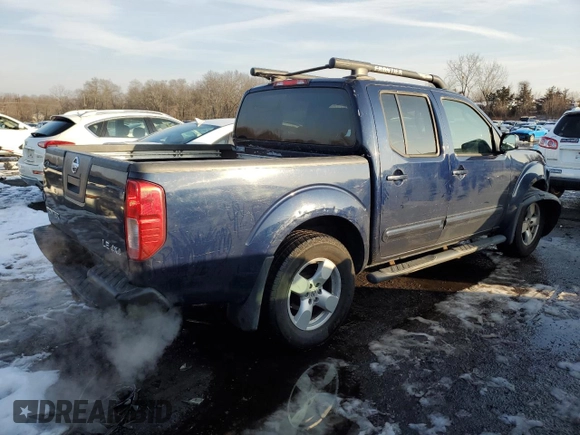 2006 Nissan Frontier LE with VIN 1N6AD07W26C430121, listed as a Copart auction lot 43353345 with 241,516 mi miles and Salvage title. Bid and sale history available at DreamBid. Image 3.
