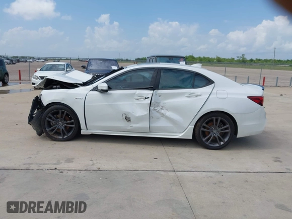 2019 Acura TLX w/A-Spec Pkg z VIN 19UUB2F62KA007114, wystawiony jako IAAI lot #42444291 z przebiegiem 164 795 mil mil oraz . Historia ofert i sprzedaży dostępna na DreamBid. Obrazek 14.