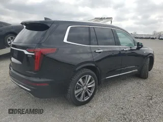 2020 Cadillac XT6 FWD Premium Luxury with VIN 1GYKPCRS2LZ138174, listed as a Copart auction lot 52495655 with 30,822 mi miles and Salvage Title. Bid and sale history available at carsss.com. Image 3.