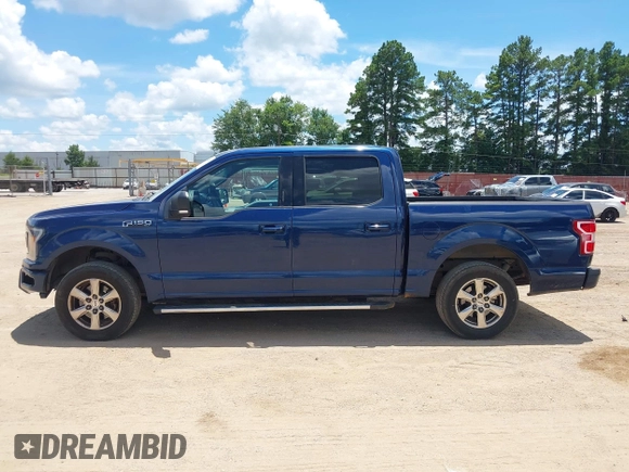 2018 Ford F-150 XL with VIN 1FTEW1CP9JKC48708, listed as a IAAI auction lot 42625137 with 209,479 mi miles and . Bid and sale history available at DreamBid. Image 14.