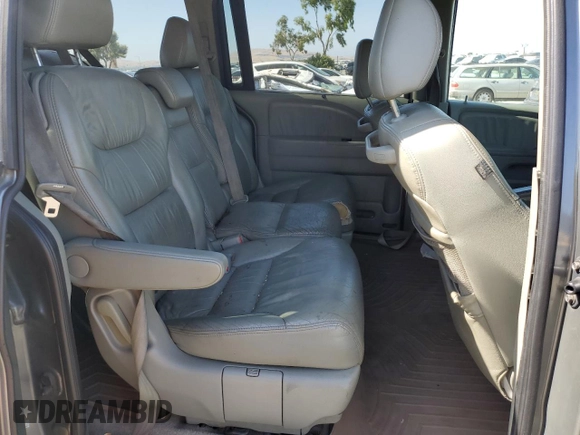 2007 Honda Odyssey EX-L z VIN 5FNRL38677B424117, wystawiony jako Copart lot #58814235 z przebiegiem 188 908 mil mil oraz Szkoda całkowita • Salvage title. Historia ofert i sprzedaży dostępna na DreamBid. Obrazek 11.