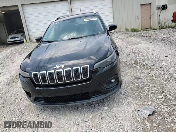 2019 Jeep Cherokee Latitude with VIN 1C4PJLCB9KD396600, listed as a Copart auction lot 59727555 with 125,893 mi miles and Salvage title. Bid and sale history available at DreamBid. Image 14.