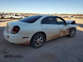 2002 Oldsmobile Aurora z VIN 1G3GR64H024127902, wystawiony jako Copart lot #86681674 z przebiegiem Nie podano mil oraz Szkody całkowita. Historia ofert i sprzedaży dostępna na DreamBid. Obrazek 3.