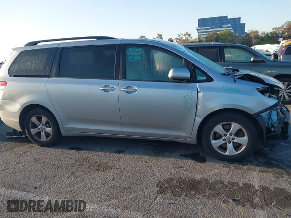 2014 Toyota Sienna LE AAS with VIN 5TDKK3DC1ES520561, listed as a IAAI auction lot 41959565 with 115,908 mi miles and . Bid and sale history available at carsss.com. Image 14.