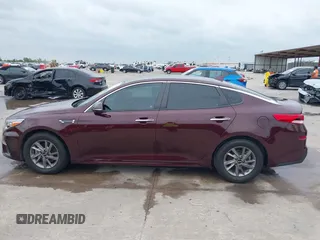 2020 Kia Optima LX z VIN 5XXGT4L37LG402118, wystawiony jako IAAI lot #42137289 z przebiegiem 47 646 mil mil oraz . Historia ofert i sprzedaży dostępna na DreamBid. Obrazek 14.