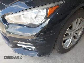 2015 Infiniti Q50 Premium z VIN JN1BV7AR9FM423471, wystawiony jako IAAI lot #42641857 z przebiegiem 86 919 mil mil oraz . Historia ofert i sprzedaży dostępna na DreamBid. Obrazek 6.
