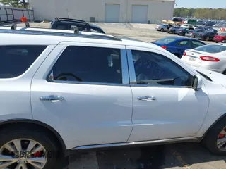 2013 Dodge Durango Crew with VIN 1C4RDHDG8DC698668, listed as a IAAI auction lot 41876841 with 160,012 mi miles and . Bid and sale history available at DreamBid. Image 13.