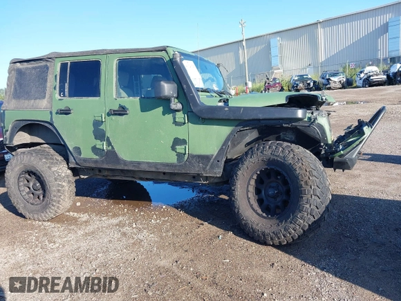 2008 Jeep Wrangler Unlimited X z VIN 1J4GA39198L612727, wystawiony jako IAAI lot #40128925 z przebiegiem 260 573 mil mil oraz . Historia ofert i sprzedaży dostępna na DreamBid. Obrazek 1.