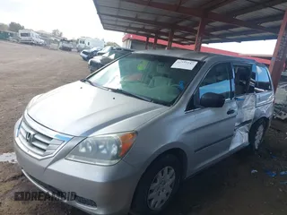 2009 Honda Odyssey LX with VIN 5FNRL38289B049418, listed as a IAAI auction lot 41777253 with 151,512 mi miles and . Bid and sale history available at DreamBid. Image 14.