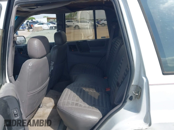 1994 Jeep Grand Cherokee Laredo with VIN 1J4FX58SXRC120936, listed as a IAAI auction lot 42530212 with 126,367 mi miles and . Bid and sale history available at DreamBid. Image 8.