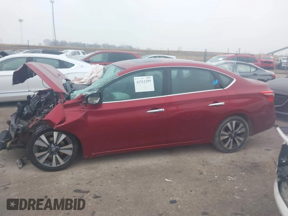 2019 Nissan Sentra S z VIN 3N1AB7AP7KY256134, wystawiony jako IAAI lot #41512289 z przebiegiem Nie podano mil oraz . Historia ofert i sprzedaży dostępna na DreamBid. Obrazek 15.