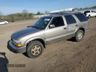 1999 Chevrolet Blazer Trailblazer z VIN 1GNDT13W0X2122216, wystawiony jako Copart lot #54400065 z przebiegiem 100 260 mil mil oraz Szkoda całkowita • Salvage title. Historia ofert i sprzedaży dostępna na DreamBid. Obrazek 1.