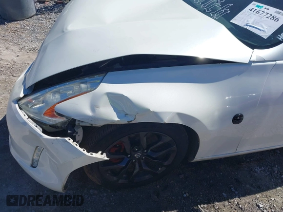 2015 Nissan 370Z Sport with VIN JN1AZ4EH9FM443719, listed as a IAAI auction lot 41677286 with 87,967 mi miles and . Bid and sale history available at DreamBid. Image 6.