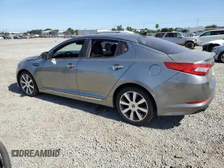 2013 Kia Optima SX с VIN 5XXGR4A63DG152535, выставлен на аукционе Copart как лот 63614895 с пробегом 172 394 миль миль и Списание • Salvage title. История ставок и продаж доступна на DreamBid. Изображение 2.
