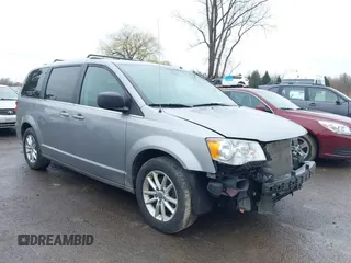 2019 Dodge Grand Caravan SXT with VIN 2C4RDGCG1KR580039, listed as a IAAI auction lot 41997472 with 163,915 mi miles and . Bid and sale history available at DreamBid. Image 1.