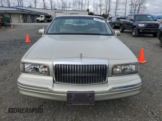 1997 Lincoln Town Car Executive z VIN 1LNLM81W9VY643745, wystawiony jako Copart lot #47921365 z przebiegiem 68 821 mil mil oraz Szkoda całkowita • Salvage title. Historia ofert i sprzedaży dostępna na DreamBid. Obrazek 5.