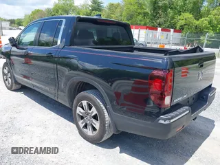 2017 Honda Ridgeline RTL with VIN 5FPYK3F51HB013989, listed as a IAAI auction lot 42206513 with 146,124 mi miles and . Bid and sale history available at DreamBid. Image 3.