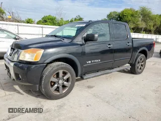 2015 Nissan Titan Pro-4X with VIN 1N6BA0EC3FN507640, listed as a Copart auction lot 63861755 with Not provided miles and Clean title. Bid and sale history available at DreamBid. Image 1.