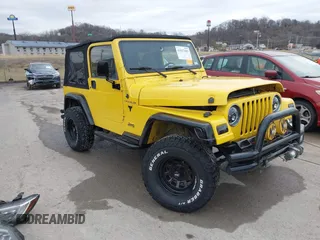 2000 Jeep Wrangler SE with VIN 1J4FA29P2YP797156, listed as a IAAI auction lot 41517183 with 114,236 mi miles. Bid and sale history available at carsss.com. Image 1.