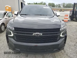 2023 Chevrolet Suburban Premier with VIN 1GNSCFKD4PR467132, listed as a Copart auction lot 57765515 with 25,934 mi miles and Clean title. Bid and sale history available at DreamBid. Image 5.