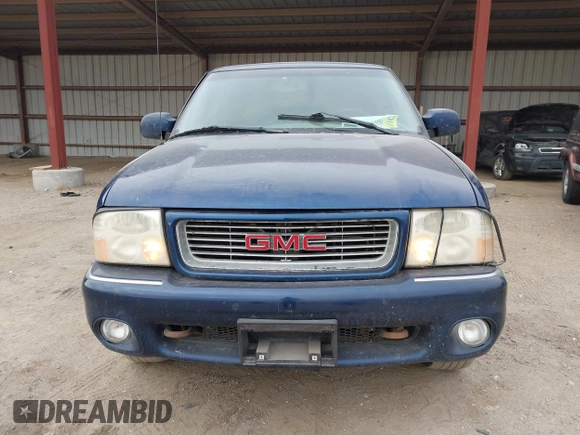2000 GMC Jimmy SLE Convenience z VIN 1GKDT13W8Y2340743, wystawiony jako IAAI lot #41393906 z przebiegiem 196 520 mil mil oraz . Historia ofert i sprzedaży dostępna na DreamBid. Obrazek 13.