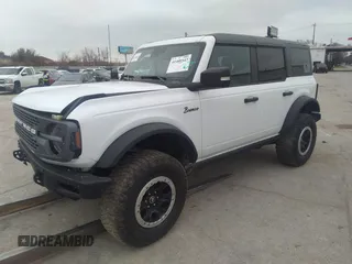 2023 Ford Bronco z VIN 1FMEE5DP9PLB30696, wystawiony jako IAAI lot #41468543 z przebiegiem 12 465 mil mil oraz . Historia ofert i sprzedaży dostępna na DreamBid. Obrazek 2.