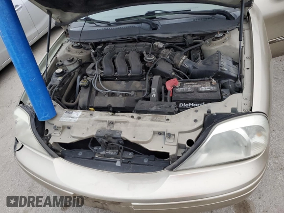 2001 Mercury Sable LS Premium with VIN 1MEFM55S61G639738, listed as a Copart auction lot 85276154 with 137,887 mi miles and Salvage Title. Bid and sale history available at DreamBid. Image 12.