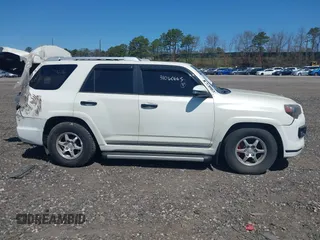 2016 Toyota 4Runner Limited with VIN JTEBU5JR9G5299522, listed as a IAAI auction lot 39205962 with 106,972 mi miles and . Bid and sale history available at DreamBid. Image 13.