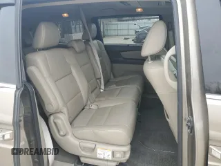 2012 Honda Odyssey Touring with VIN 5FNRL5H9XCB078399, listed as a Copart auction lot 52360165 with 174,819 mi miles and Salvage Title. Bid and sale history available at DreamBid. Image 12.